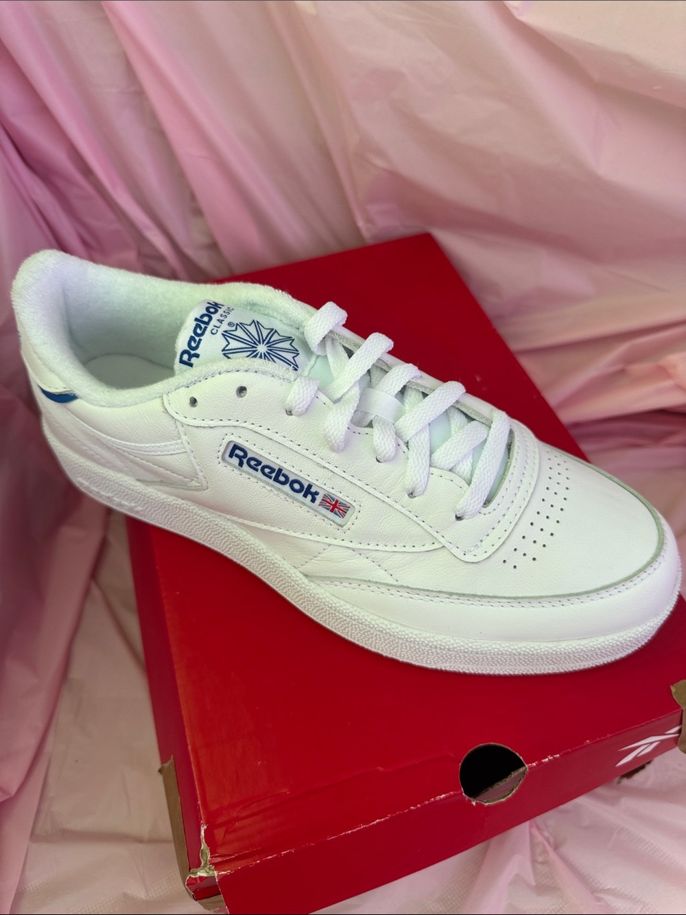 Reebok White Sneakers with Blue Logo